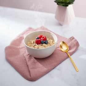 Nature's Path oatmeal bowl steaming, inviting a comforting breakfast.