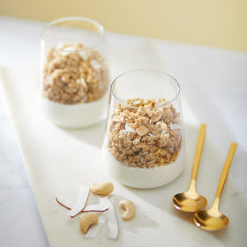 Nature's Path organic whole grain oats with coconut chunks deliver fiber for mornings.