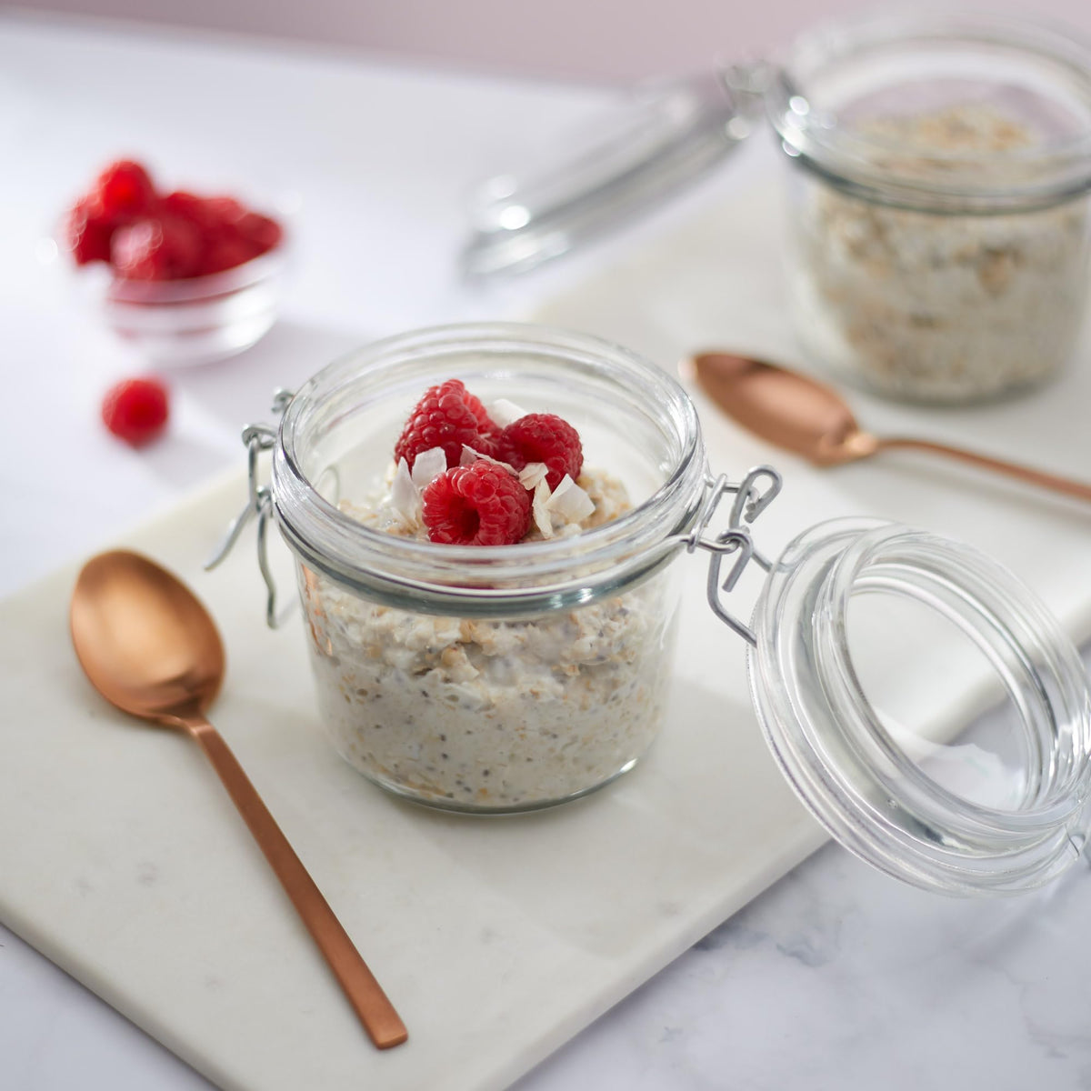 Nature's Path Qi'a Creamy Coconut Oatmeal pouring oats reveals creamy texture.