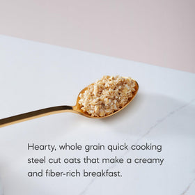 Nature's Path steel cut oats being poured with hot water for quick prep.