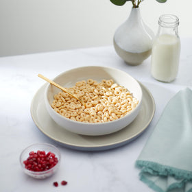 Nature's Path Whole O's with bowl and spoon showing wholesome grains.
