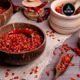 Naturevibe Botanicals Red Chilli Powder canister enhances curry heat.