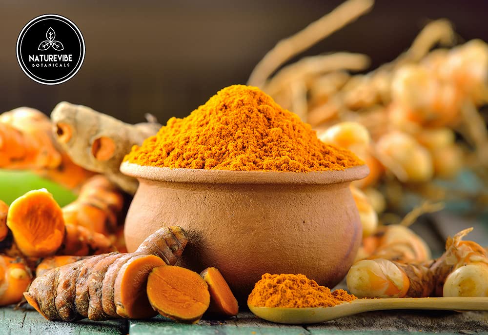 Naturevibe Botanicals turmeric powder in a bowl ready for cooking.