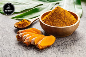 Naturevibe Botanicals turmeric powder close-up with vibrant curcumin color.