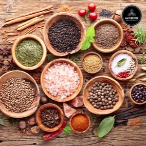 Naturevibe Botanicals cumin seed powder dusted over curry for depth.