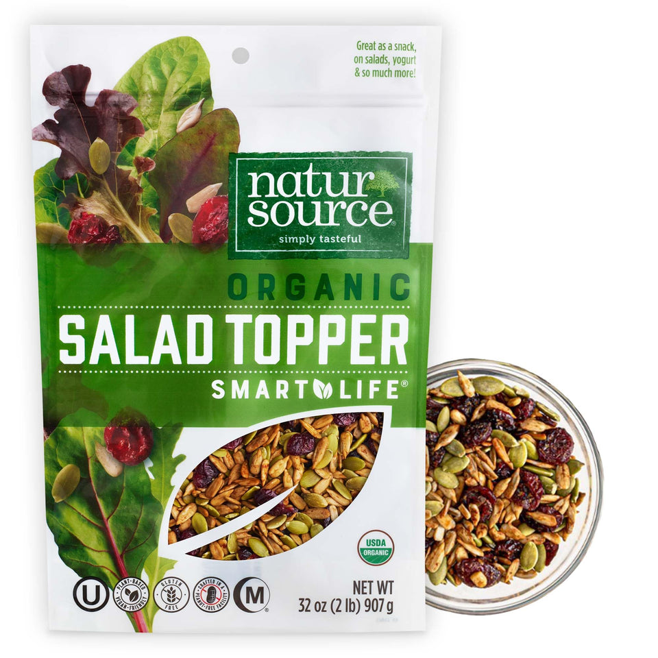 NaturSource Organic Salad Topper with cranberries and seeds on a fresh salad for crunch.