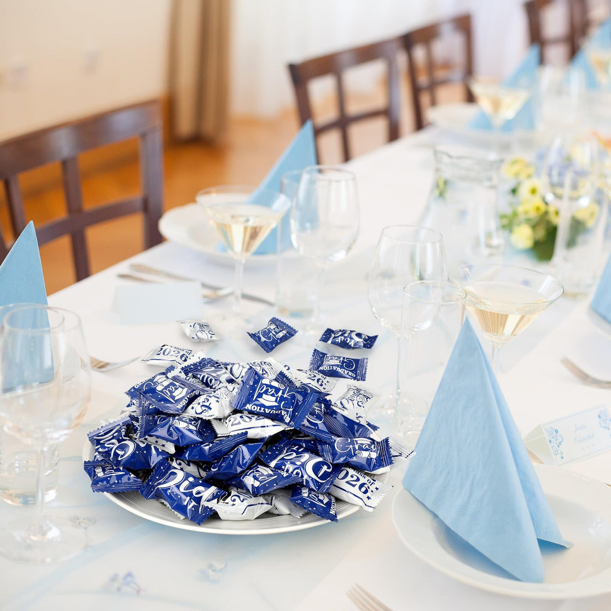 Naucoos Graduation candy table display complements 2026 themes.