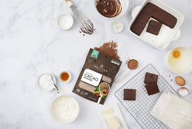 Navitas Organics cacao powder in a smoothie for a bold chocolate boost.