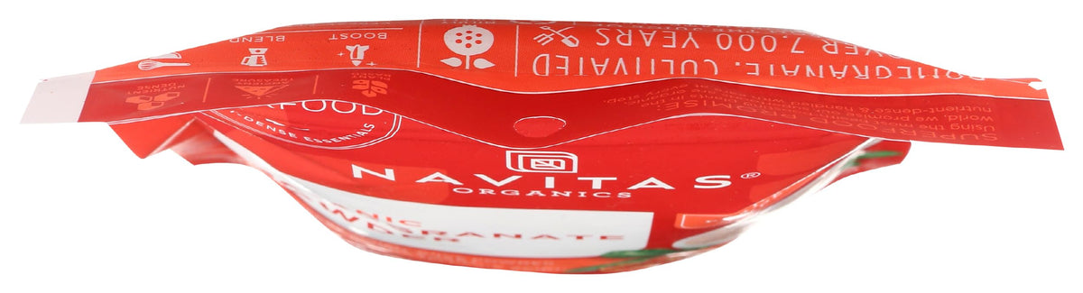 Navitas Organics Pomegranate Powder stirred into yogurt for natural sweetness and color