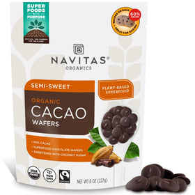 Navitas Organics semi-sweet cacao wafers in bag, ideal for baking and snacking.