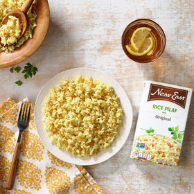 Near East Rice Pilaf Mix seasoning packet with herbs for authentic flavor