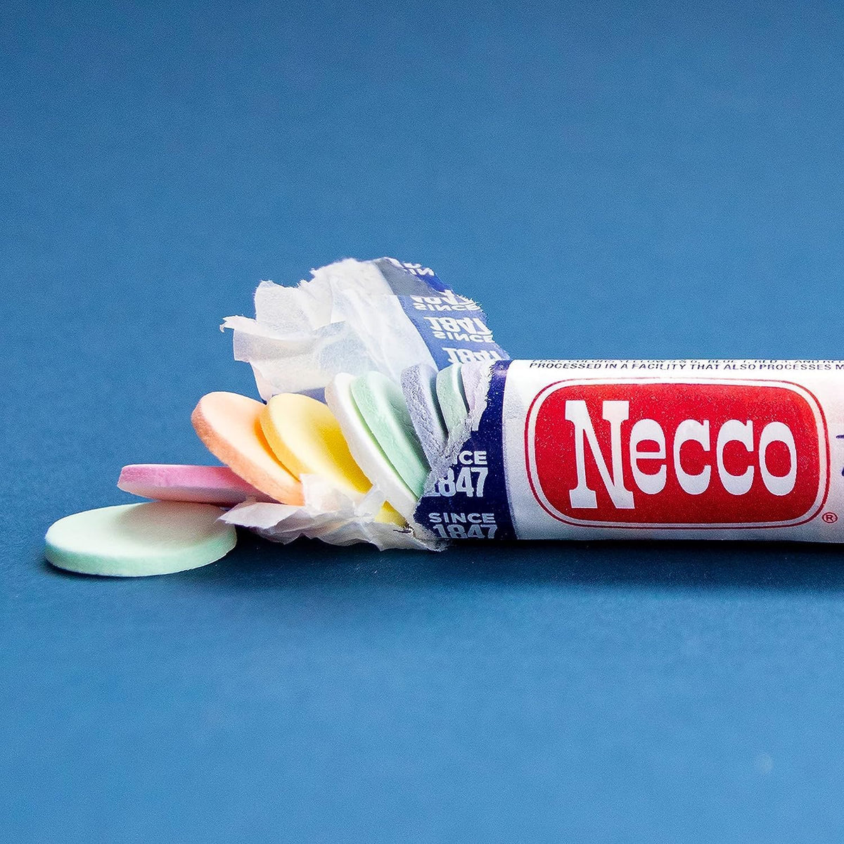 Family enjoys Necco Wafers during game night.