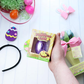 Needzo Belgian milk chocolate egg with marshmallow chick inside, perfect for baskets.
