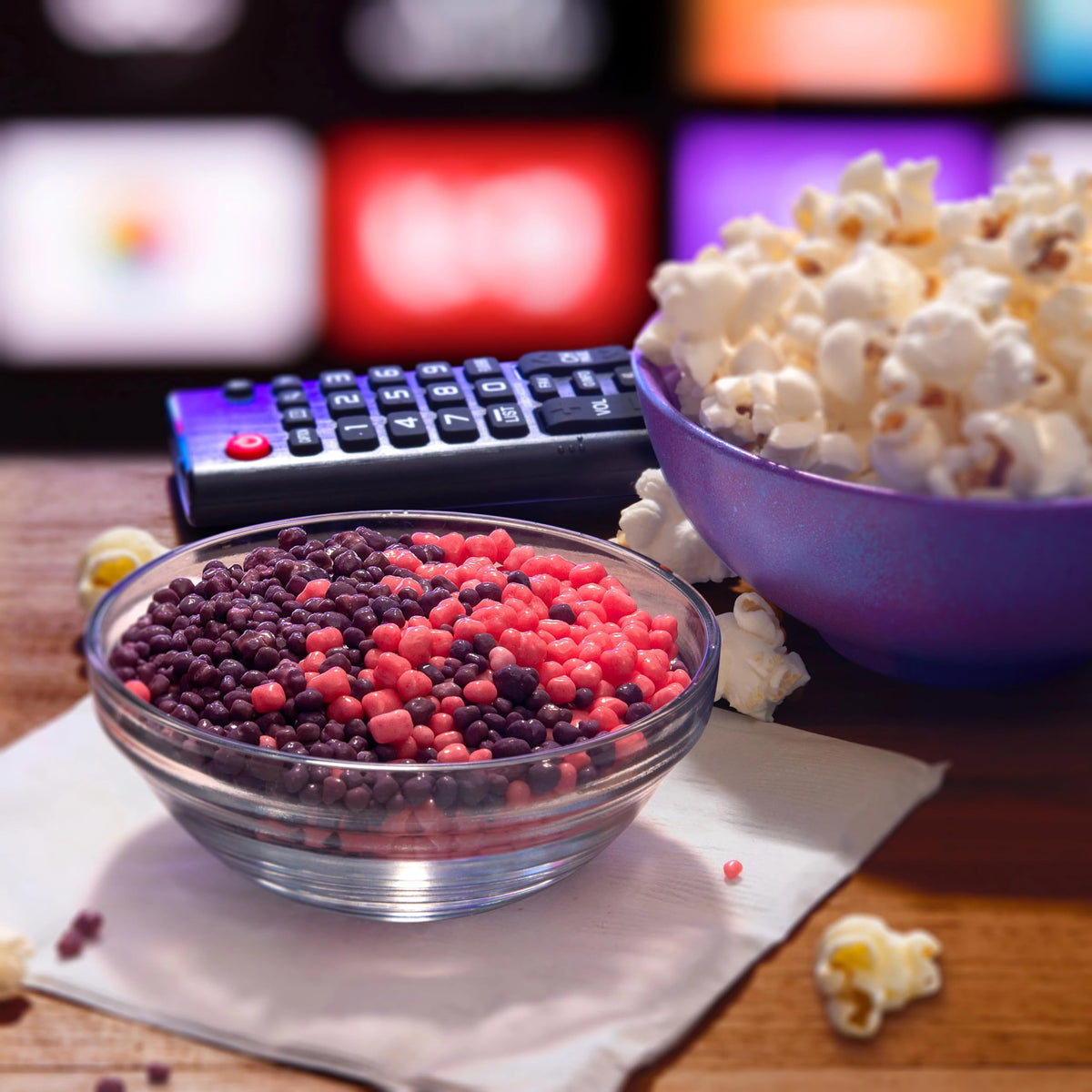 Colorful Nerds packaging with grape and strawberry tones inviting, vibrant snack option.