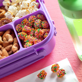 NERDS Gummy Clusters office snack bowl, colorful treats to boost break-time vibes.