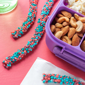 Nerds Rope Very Berry bulk snack box on shelf.