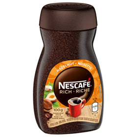 NESCAFÉ Rich Hazelnut cup steaming for a comforting caffeine boost.