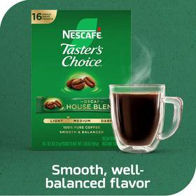 Cup with steam beside NESCAFÉ Taster's Choice packets signaling a warm brew
