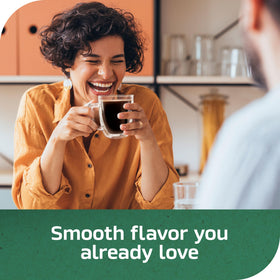 NESCAFÉ Taster's Choice Decaf package being dispensed into a cup
