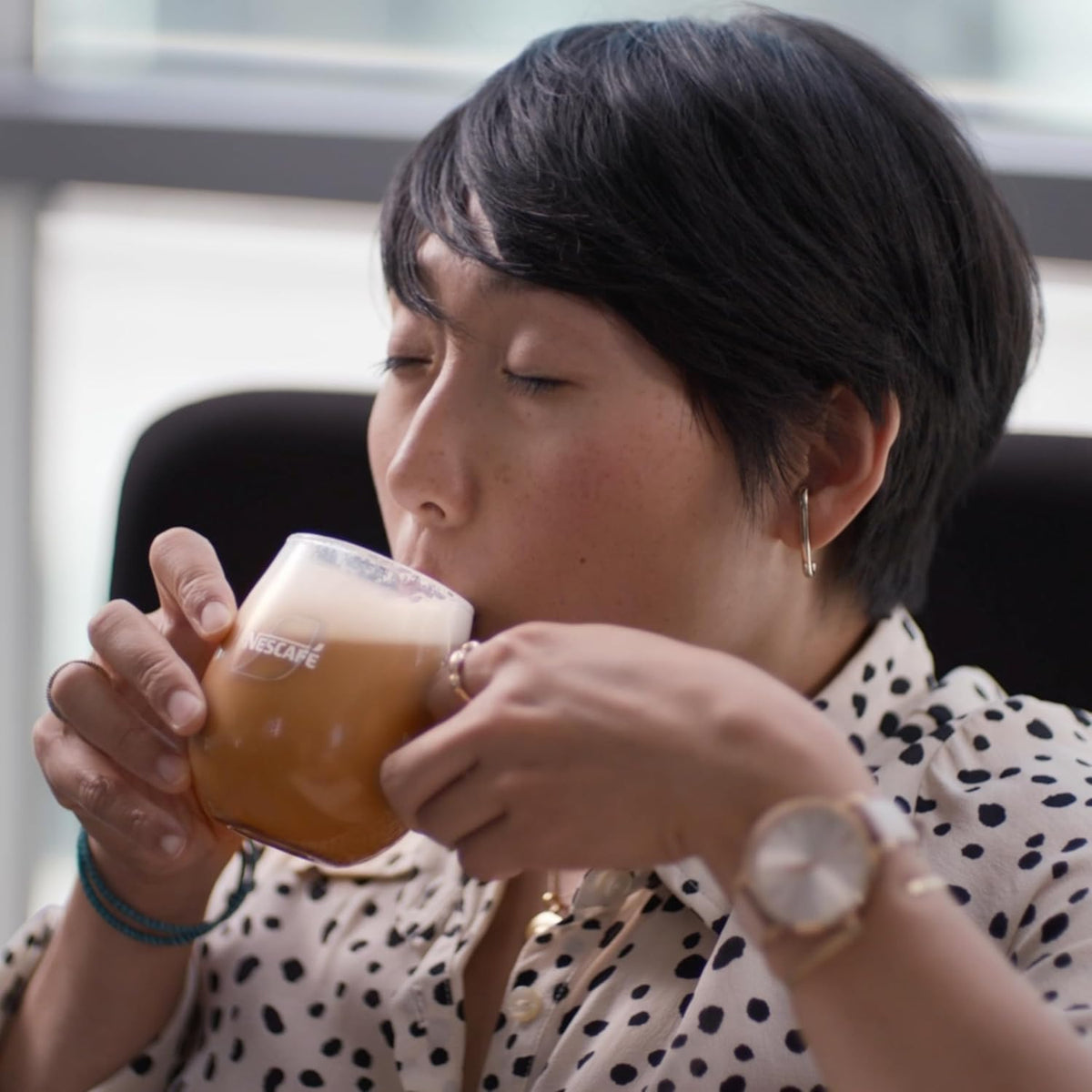 NESCAFE unsweet cappuccino on a desk, ideal for a quick break