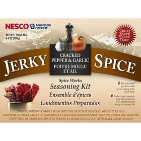 Outdoor hunting camp setup with Nesco BJT-6 jerky seasoning.