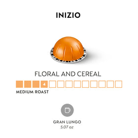 Nespresso Vertuo Inizio capsule closeup reveals floral notes and smooth crema.