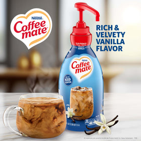 Nestle Coffee mate French Vanilla pump-action dispensing in a busy break room.