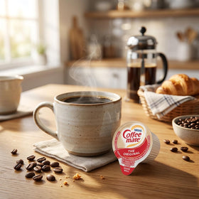 Nestle Coffee mate singles six flavors assortment, colorful packaging for office kitchens.