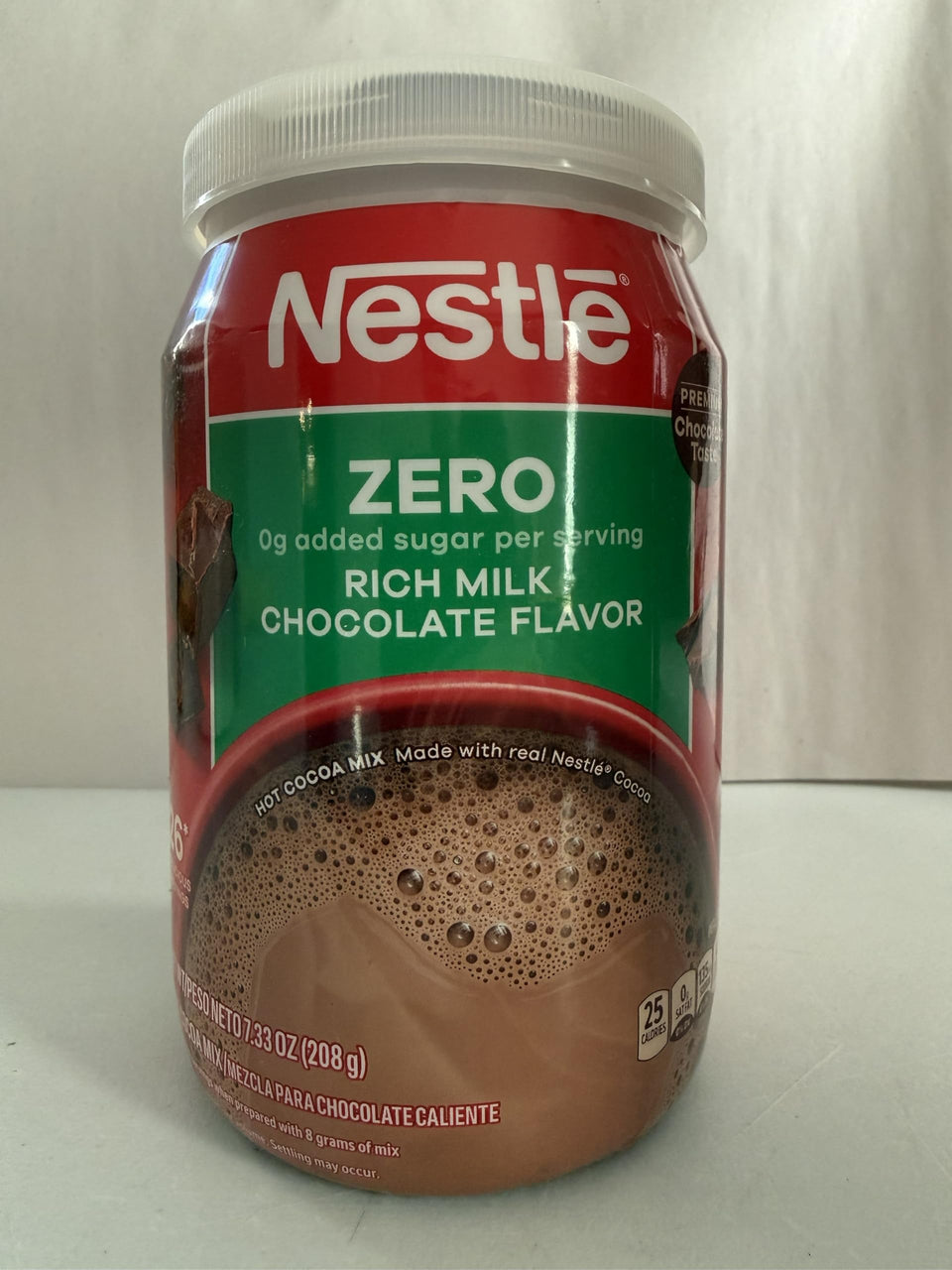 Nestle Hot Cocoa Fat Free Canister 3pc pack viewed for quick, creamy cocoa moments.