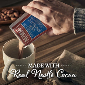 Nestle Hot Cocoa in a cafeteria counter setup for quick breaks.