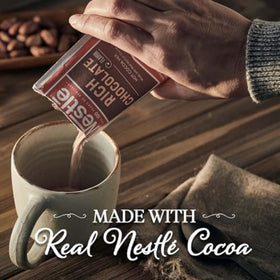 Nestlé Hot Cocoa sachet close-up highlighting real cocoa.