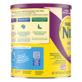 Nestlé NIDO Lacto-Ease powder mixed with warm water for a smooth drink.