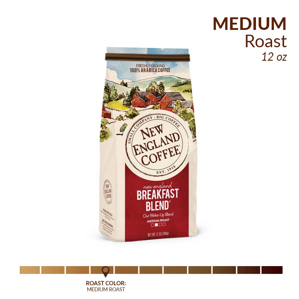 New England Coffee Breakfast Blend beans close-up highlighting 100% Arabica quality and sourcing