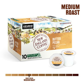 New England Coffee Butter Pecan pods with a steaming cup highlighting rich aroma.
