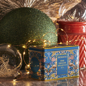 Artwork inspired by William Morris enhances the tin's decorative appeal