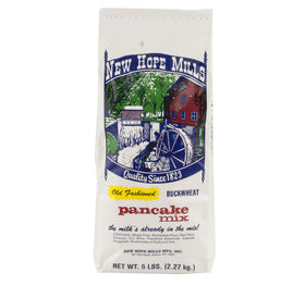 New Hope Mills Buckwheat Pancake Mix packaging on shelf, convenient and easy to store.