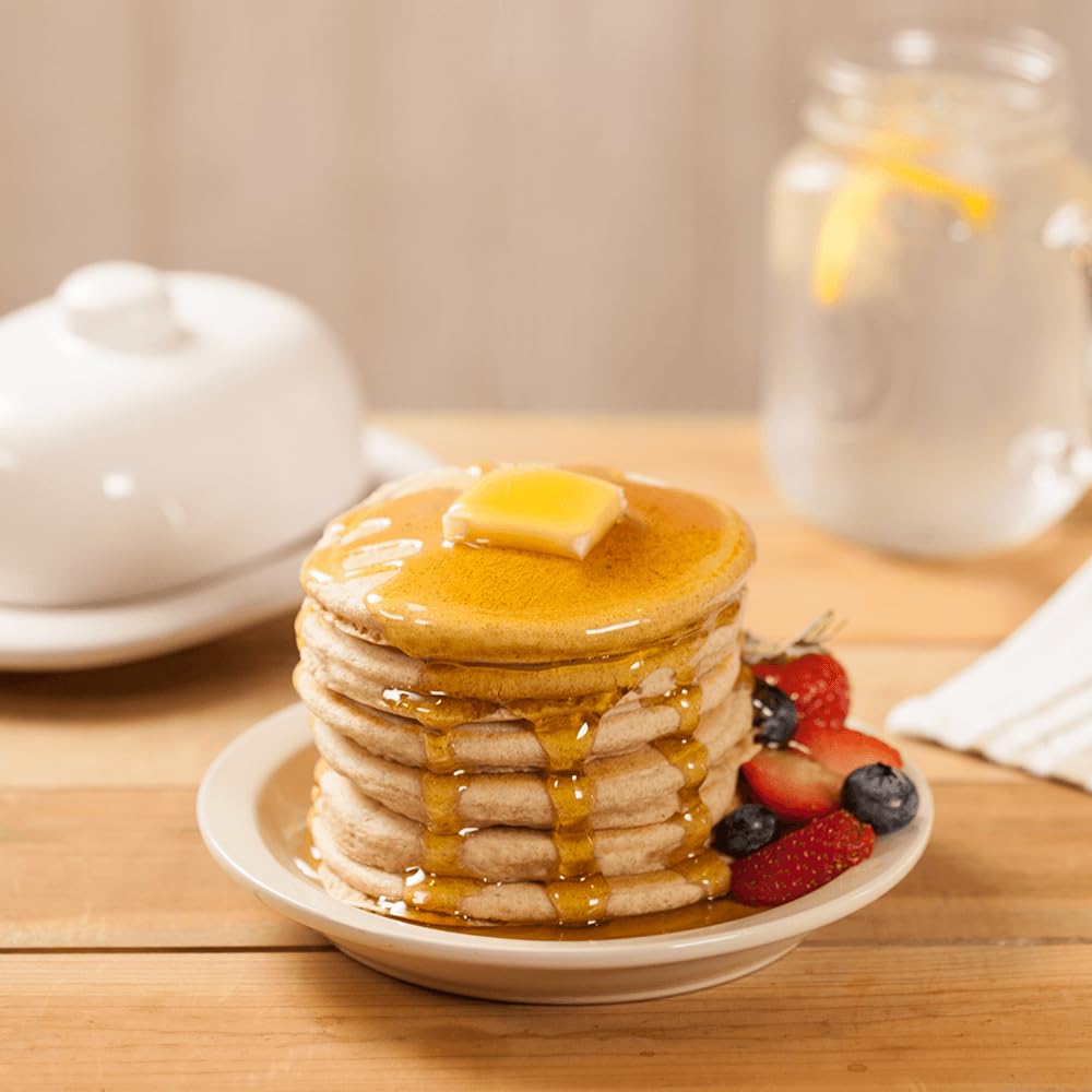 New Hope Mills pancake mix pour captures batter ready for fluffy, sugar-free pancakes.