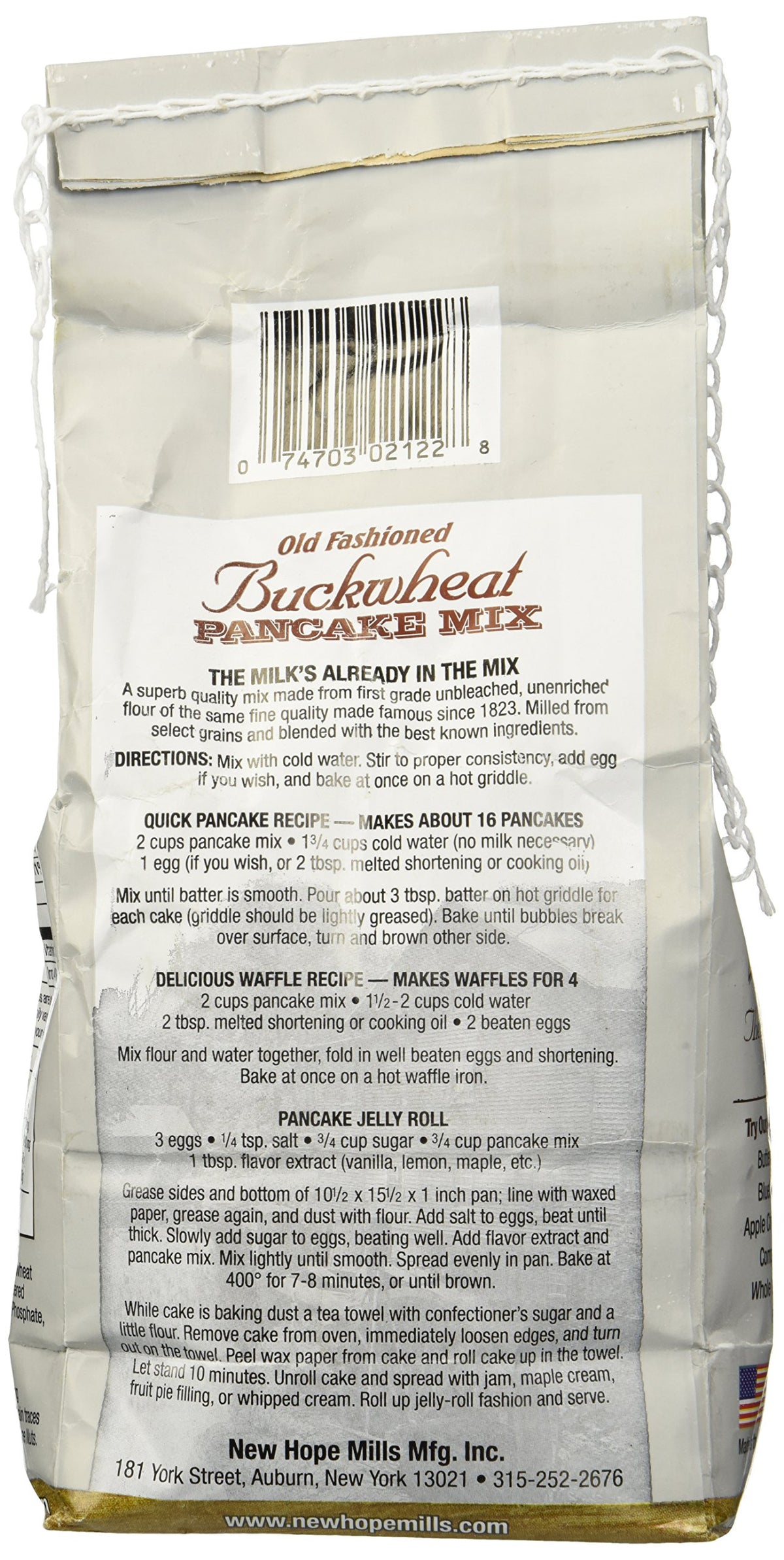 New Hope Mills Buckwheat Pancake Mix pancakes ready to serve with butter and syrup.
