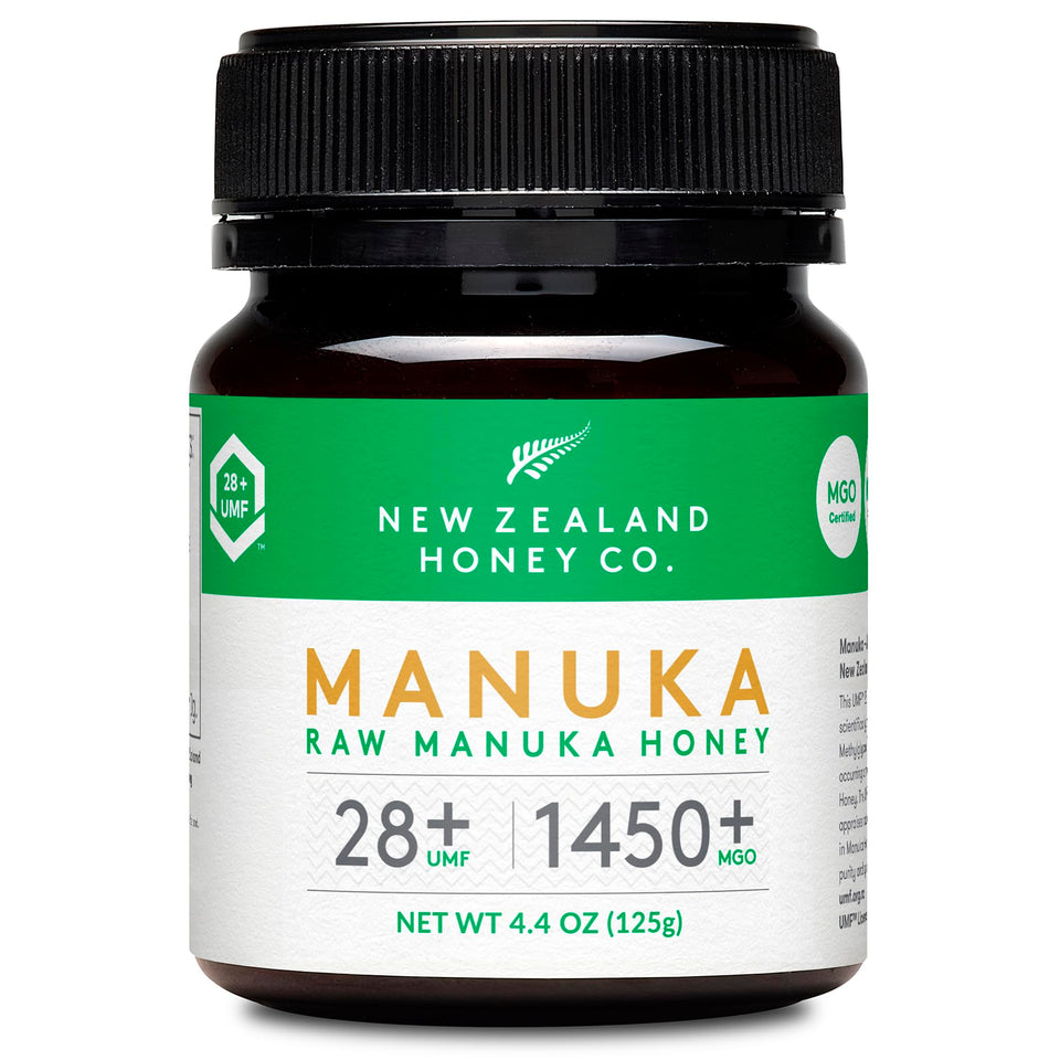 New Zealand Honey Co Raw Manuka UMF 28+ jar close-up highlighting premium quality