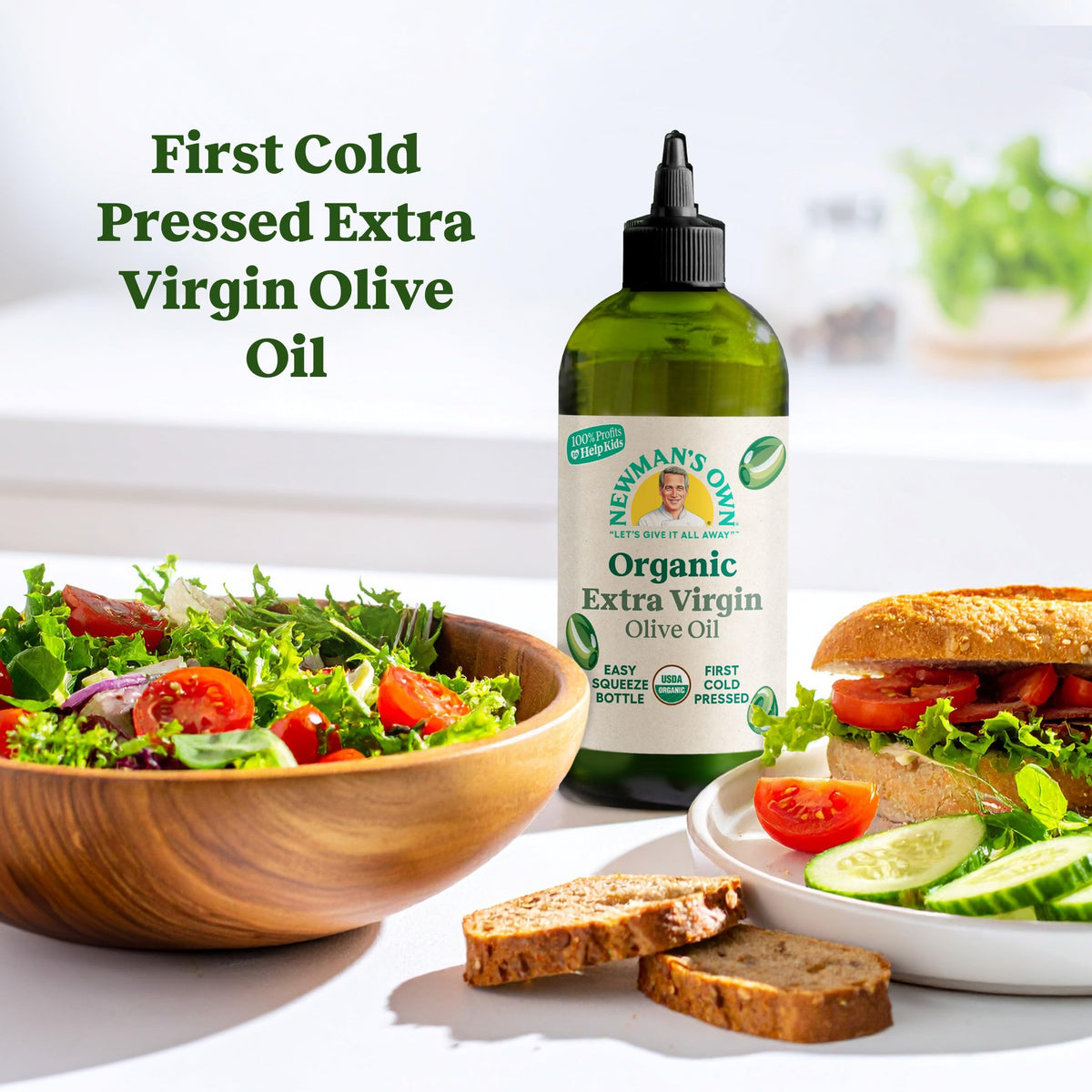 Newman's Own Organic EVOO drizzle over fresh salad highlights balanced flavor.