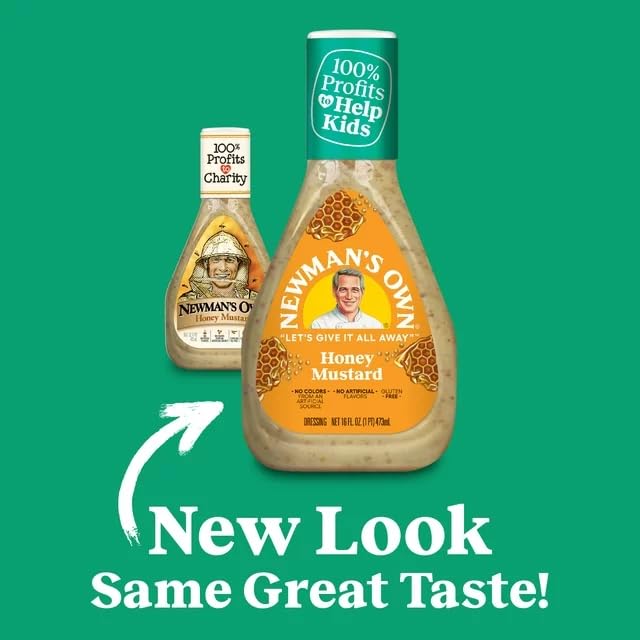 Newman's Own Honey Mustard Dressing pouring from a glass bottle for versatile use.