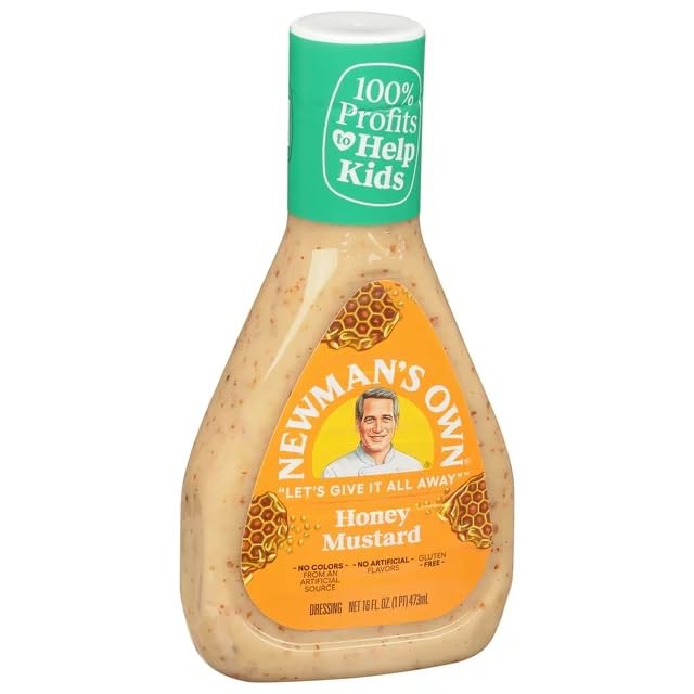 Marination bowl with Newman's Own Honey Mustard Dressing adding flavor to proteins.