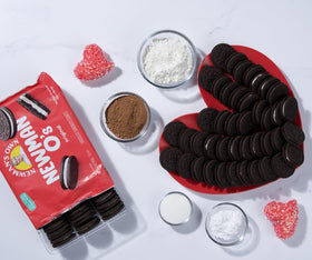 Newman's Own Newman-O's packaging shot highlighting organic ingredients and a dairy-free snack.
