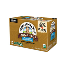 Newman's Own Organic Special Blend coffee pod closeup with beans showing rich aroma.