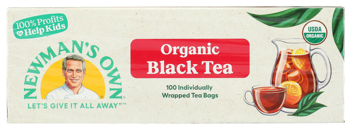 Pouring hot water over a Newman's Own Organics Royal Black Tea bag.