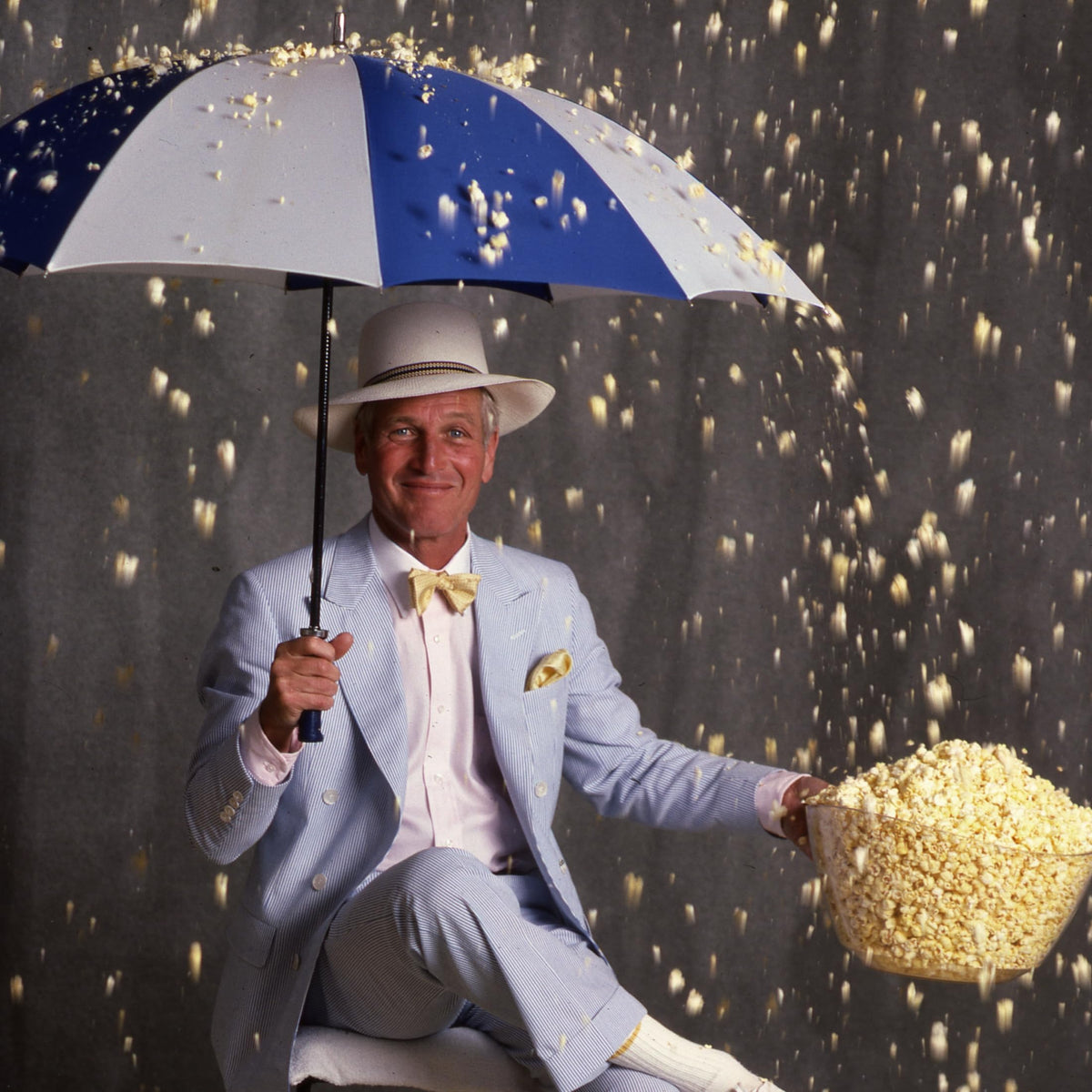 Newman's Own Sea Salt microwave popcorn closeup shows whole grain kernels for a wholesome snack.