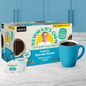 Keurig-compatible Newman's Own K-Cups arranged at coffee station for quick single-serve mornings.
