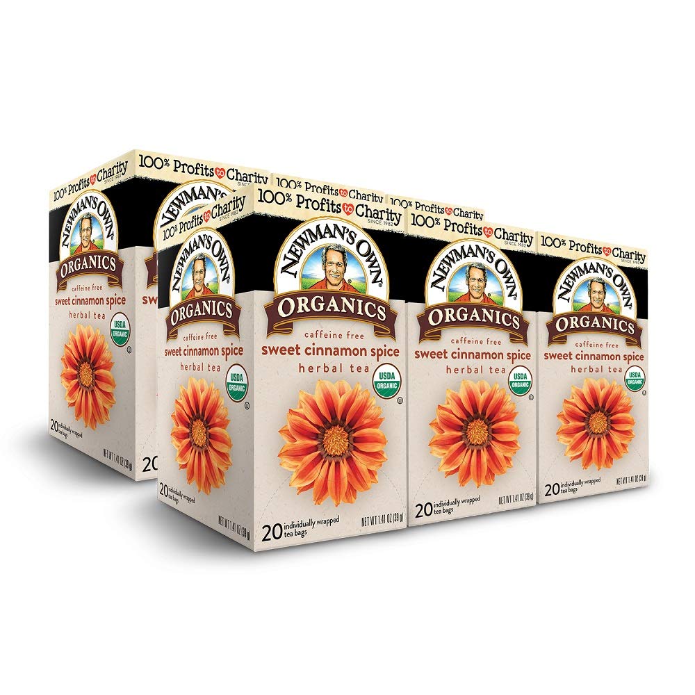 Newman's Own Organic Sweet Cinnamon Spice Tea boxes show a comforting herbal blend for cozy mornings.