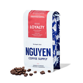 Nguyen Coffee Supply Loyalty Signature Robusta-Arabica beans in a bag for a smooth, balanced brew.