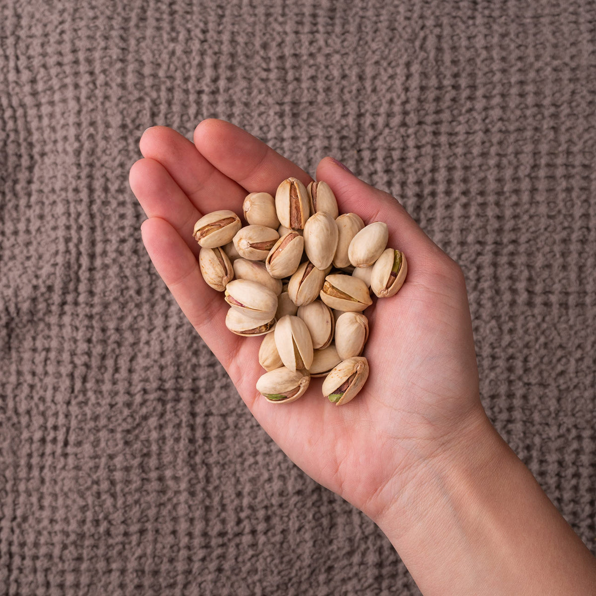 Nichols Farms California pistachios stay fresh in a sealed 32 oz bag